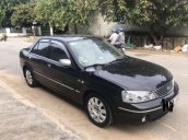 Cần bán Ford Laser đời 2005, màu đen còn mới, 185tr