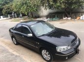 Cần bán Ford Laser đời 2005, màu đen còn mới, 185tr