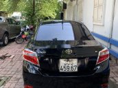 Bán xe Toyota Vios đời 2015, màu đen xe gia đình 