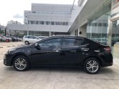 Cần bán Toyota Corolla Altis 1.8G đời 2016, màu đen  