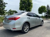 Cần bán lại xe Toyota Corolla Altis đời 2015, màu bạc còn mới 