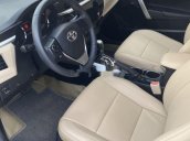 Cần bán lại xe Toyota Corolla Altis đời 2015, màu bạc còn mới 