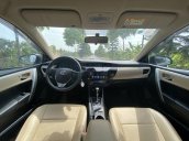 Cần bán lại xe Toyota Corolla Altis đời 2015, màu bạc còn mới 