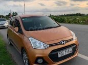 Bán ô tô Hyundai Grand i10 2015, màu vàng đồng, xe nhập xe gia đình, giá tốt