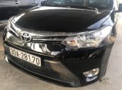 Bán xe Toyota Vios đời 2014, màu đen còn mới