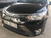 Bán xe Toyota Vios đời 2014, màu đen còn mới