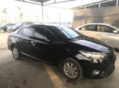 Bán xe Toyota Vios đời 2014, màu đen còn mới