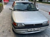 Cần bán lại xe Mazda 323 đời 1995, màu bạc, nhập khẩu