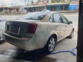 Bán Daewoo Lacetti năm sản xuất 2004, màu vàng cát