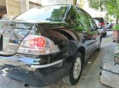 Cần bán gấp Mitsubishi Lancer GLX đời 2004, màu đen, xe nhập  