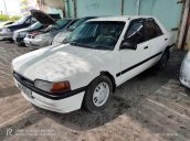 Bán ô tô Mazda 323 đời 1995, màu trắng, xe nhập còn mới