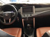 Bán xe Toyota Innova E 2.0MT đời 2019, màu xám còn mới giá cạnh tranh