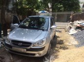 Cần bán xe Hyundai Getz đời 2010, màu bạc, xe gia đình