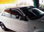 Gia đình bán xe Ford Laser đời 2003, màu trắng, nhập khẩu