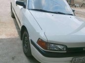 Cần bán gấp Mazda 323 đời 1995, màu trắng