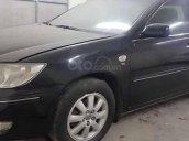 Bán xe Toyota Camry 3.0V 2003, màu đen còn mới 