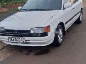 Bán Mazda 323 sản xuất năm 1995, màu trắng, nhập khẩu, máy lạnh đầy đủ