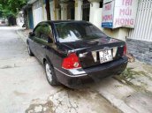 Bán xe Ford Laser sản xuất 2004, màu đen, xe nhập 