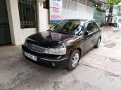 Bán xe Ford Laser sản xuất 2004, màu đen, xe nhập 