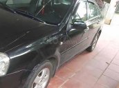 Cần bán lại xe Daewoo Lacetti EX 1.6 MT 2007, màu đen xe gia đình