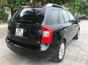 Cần bán lại xe Kia Carens SX AT đời 2011, màu đen còn mới