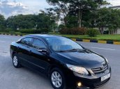 Bán ô tô Toyota Corolla Altis đời 2010, màu đen số sàn