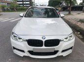 Chính chủ bán BMW 320i LCI model 2017 màu trắng nội thất kem, đã lên body Msport và la zăng thể thao