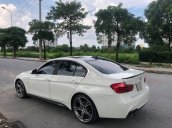 Chính chủ bán BMW 320i LCI model 2017 màu trắng nội thất kem, đã lên body Msport và la zăng thể thao