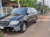 Cần bán xe Kia Carnival đời 2008, màu đen xe gia đình, giá tốt