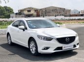 Cần bán gấp Mazda 6 2.0AT đời 2016, màu trắng còn mới