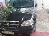 Cần bán xe Kia Carnival đời 2008, màu đen xe gia đình, giá tốt