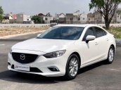 Cần bán gấp Mazda 6 2.0AT đời 2016, màu trắng còn mới