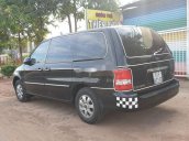 Cần bán xe Kia Carnival đời 2008, màu đen xe gia đình, giá tốt