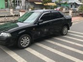 Cần bán Ford Laser năm 2001, màu đen, xe nhập 