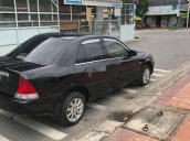 Cần bán Ford Laser năm 2001, màu đen, xe nhập 