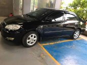 Cần bán Toyota Corolla Altis sản xuất 2004, màu đen còn mới 