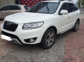 Gia đình cần bán xe Hyundai Santafe trắng, đời 2011, đẹp không tì vết