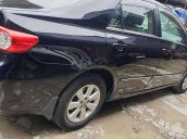 Cần bán lại xe Toyota Corolla Altis 1.8 G đời 2012, màu đen còn mới 