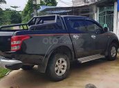 Bán Mitsubishi Triton 4x2 AT năm 2015, màu đen, nhập khẩu còn mới 
