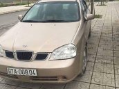 Cần bán gấp Daewoo Lacetti sản xuất 2004, màu vàng còn mới