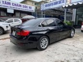 Bán BMW 320i sản xuất 2013, màu đen, giá tốt