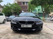 Bán BMW 320i sản xuất 2013, màu đen, giá tốt