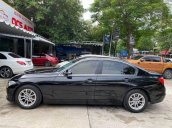 Bán BMW 320i sản xuất 2013, màu đen, giá tốt