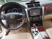 Bán Toyota Camry năm 2014, màu vàng còn mới, giá chỉ 660 triệu