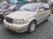 Cần bán gấp Kia Carnival sản xuất 2008 màu ghi vàng, giá tốt