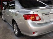 Bán ô tô Toyota Corolla Altis năm 2009, màu bạc, số sàn 