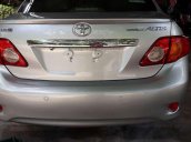 Bán ô tô Toyota Corolla Altis năm 2009, màu bạc, số sàn 