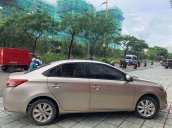 Bán Toyota Vios 2015, màu vàng còn mới giá cạnh tranh