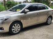 Cần bán Toyota Vios 2015, màu vàng còn mới