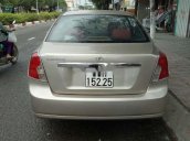 Cần bán xe Daewoo Lacetti đời 2004, màu vàng cát